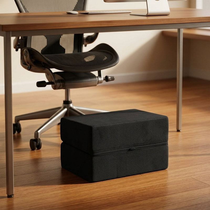 Hassock ergonomic desk footrest under an office desk