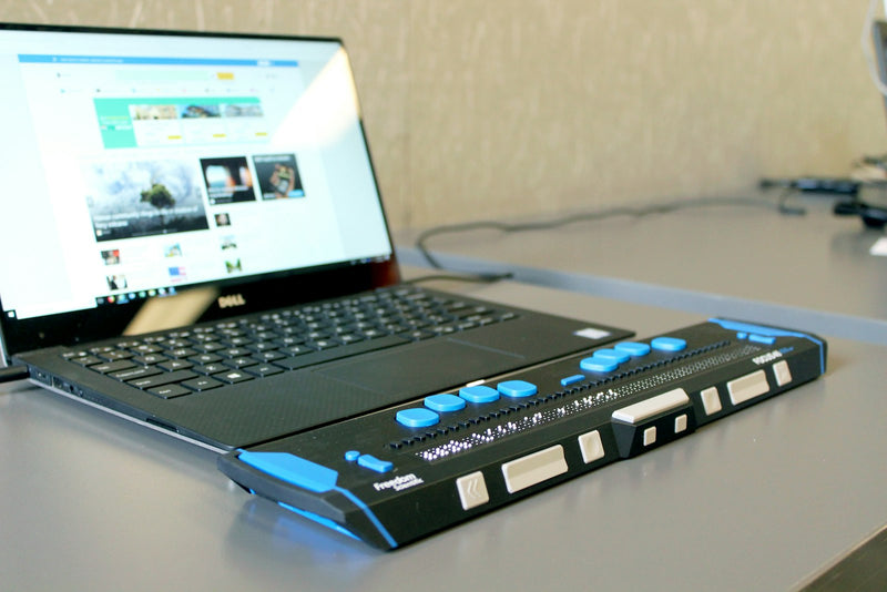 Open laptop on a clean desk in a calm, well-lit workspace