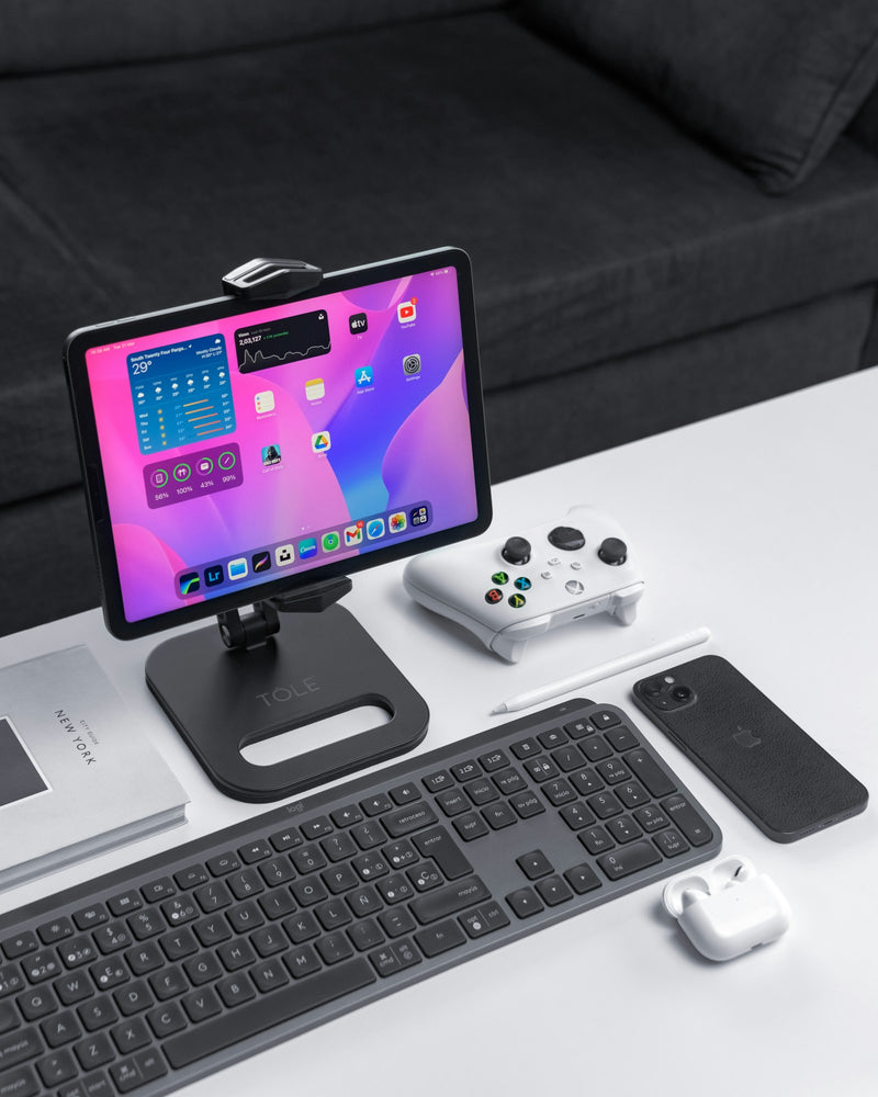 Clean desk with a monitor, keyboard and mouse in neutral tones
