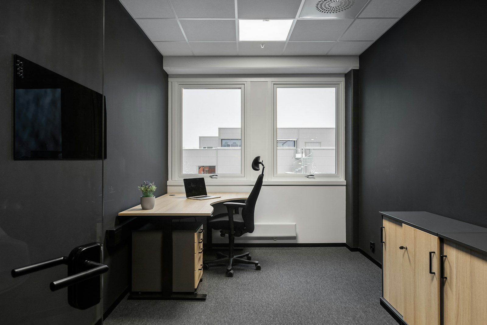 Calm office with a desk and chair in soft natural light