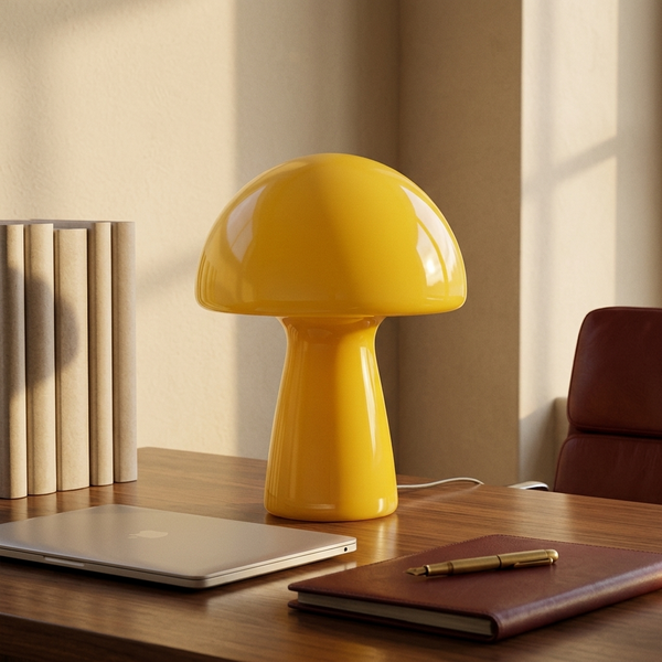 Glass Mushroom Tableside Lamp, yellow in a workspace