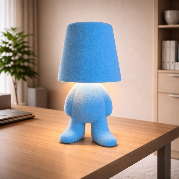 Golden Man Table Lamp Night Light, blue in a workspace