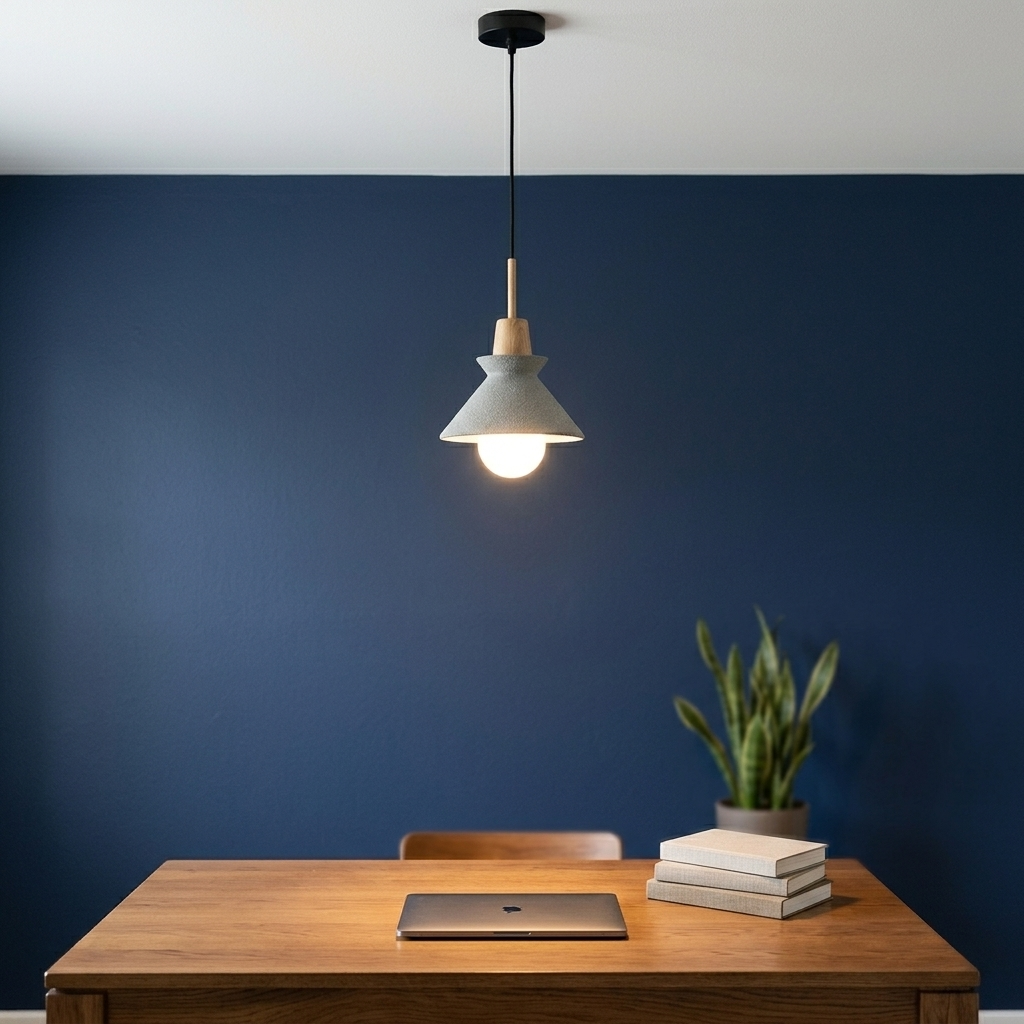 Cairn Gray in a workspace, light on