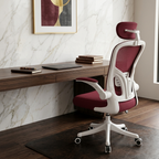 Wine red mesh ergonomic office chair by an executive entryway console