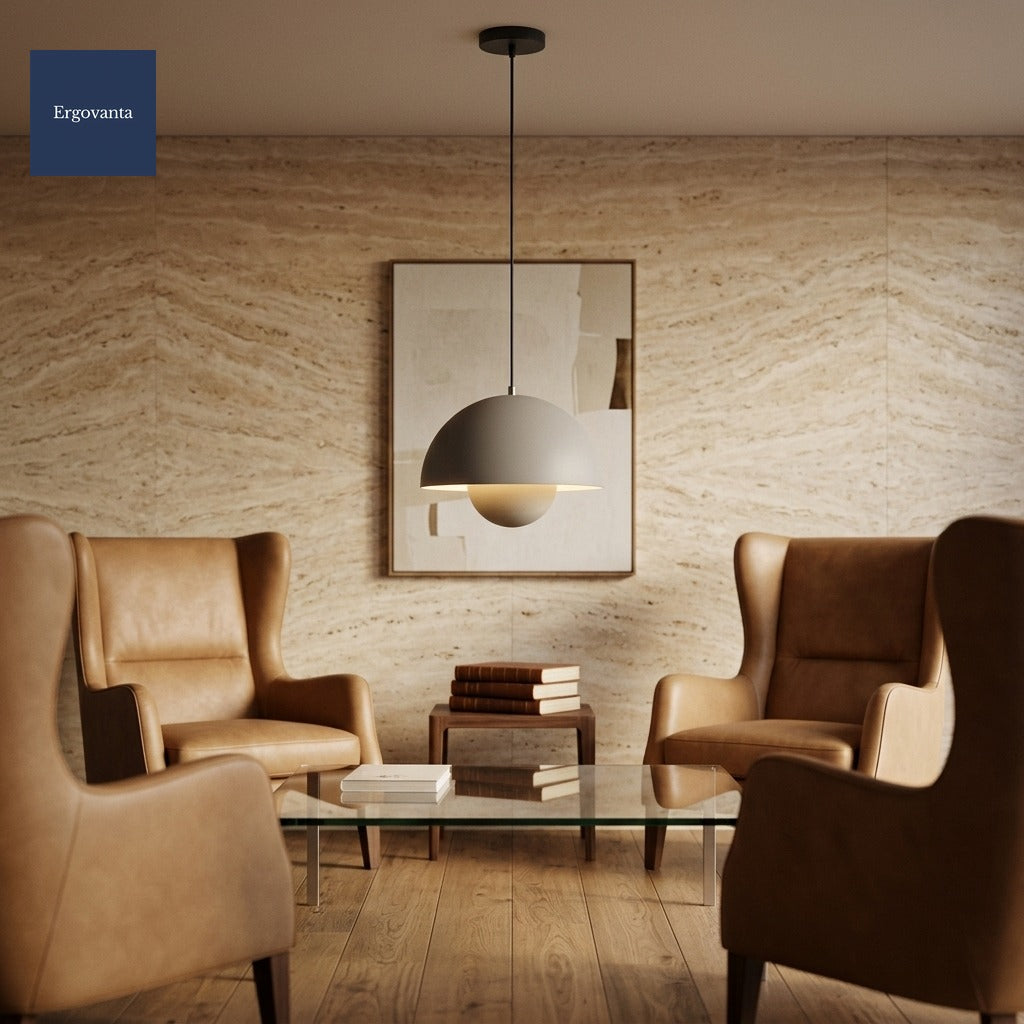 Gray Sculptural Bud Pendant in an executive lounge above a glass coffee table with leather club chairs