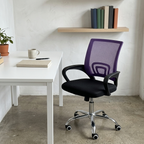 Purple mesh task chair in a creative home studio