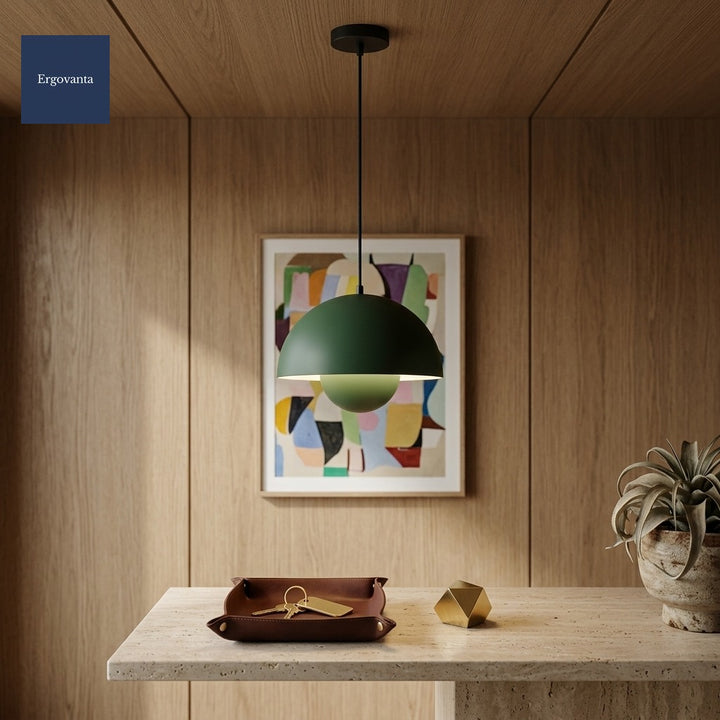 Green Sculptural Bud Pendant in an executive entryway above a travertine console with leather valet