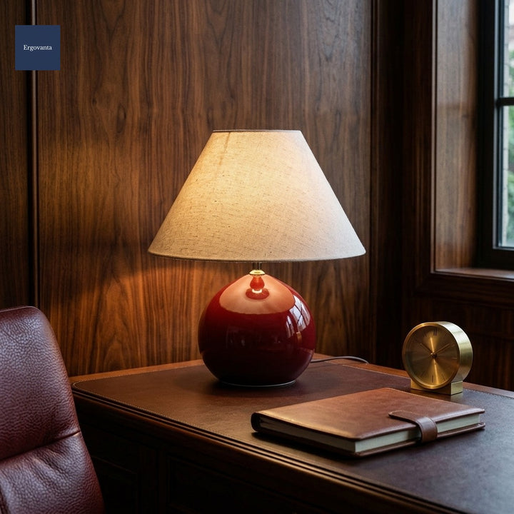 Vintage ceramic lamp on leather credenza at dusk