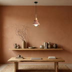 Compact Wood Pendant Light in speckled Stone Orange, in an artisanal studio