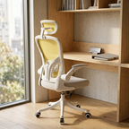 Yellow mesh ergonomic office chair in a bright coworking pod