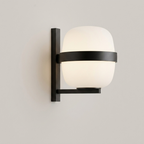 Frosted Glass Cocoon Wall Sconce in matte black, studio view