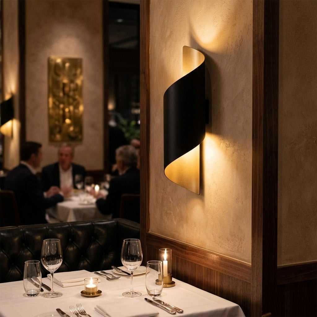 The Spiral Up-Down Wall Sconce in a restaurant dining room